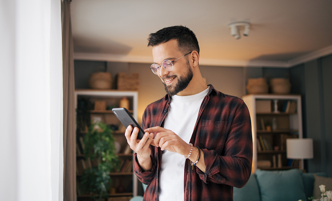 Smiling Man with Cell Phone