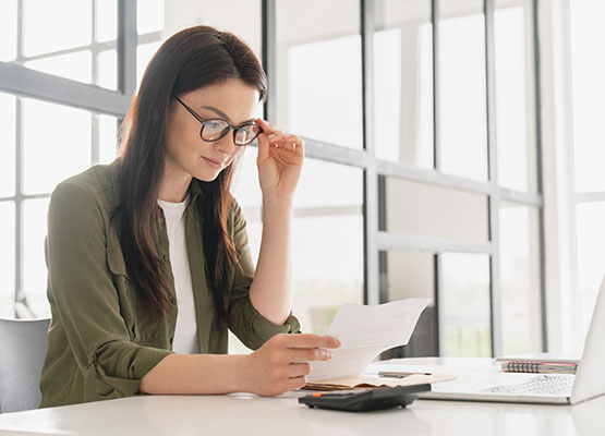 Woman Reviewing paperwork